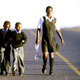 Children run to school in Kwa-Zulu Natal, South Africa